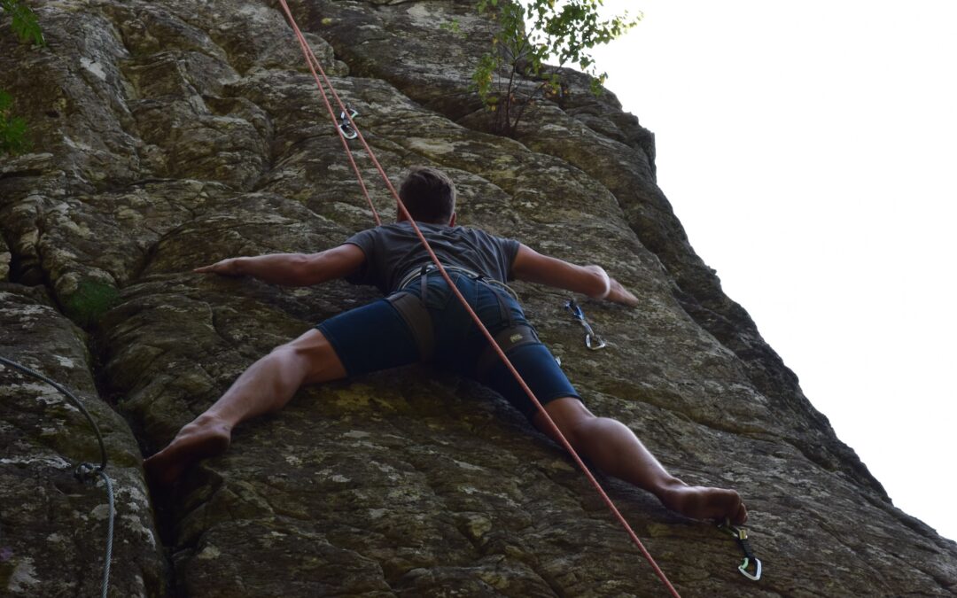 a man rock climbing